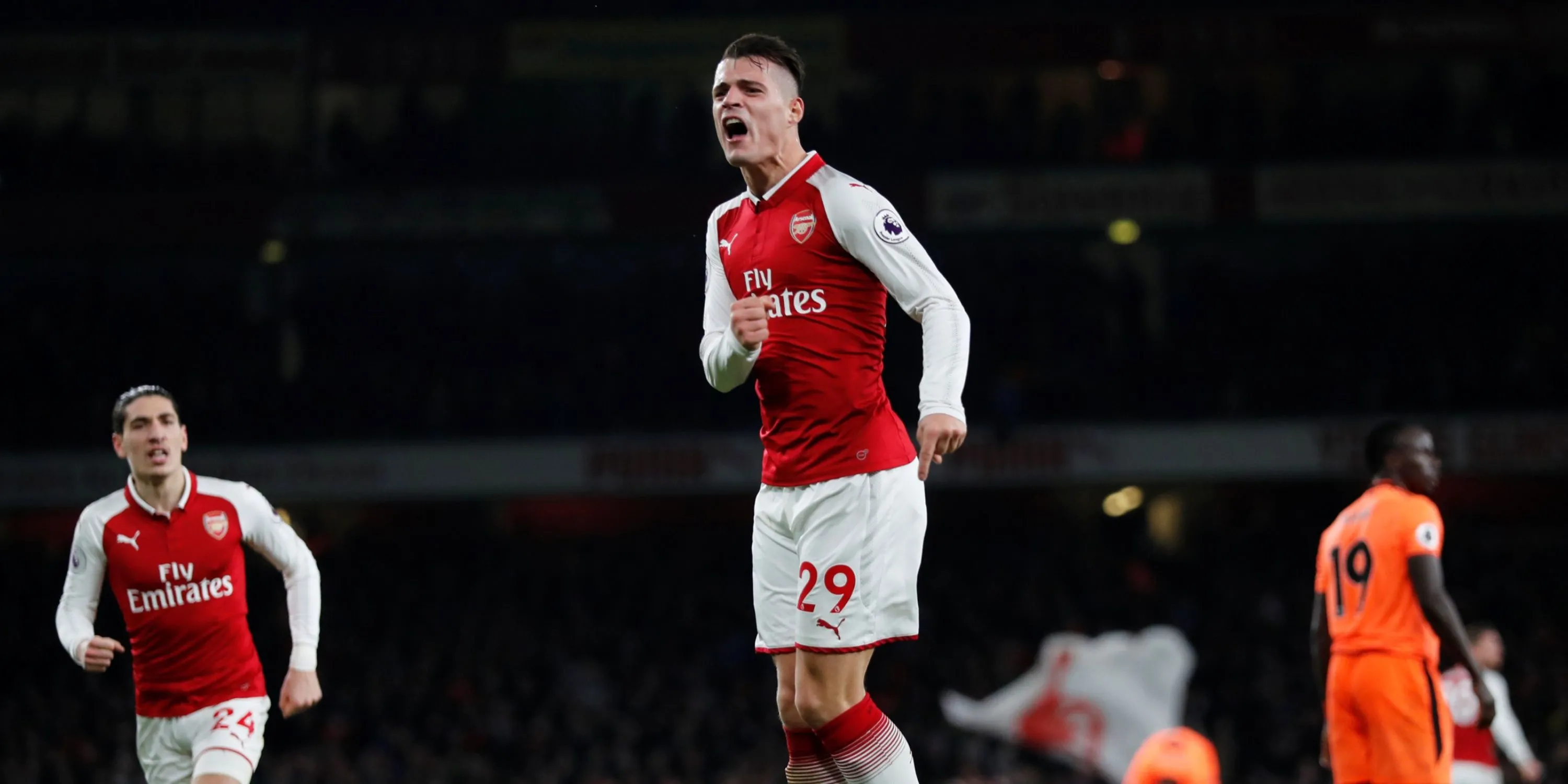 Collage Granit Xhaka trong màu áo Arsenal